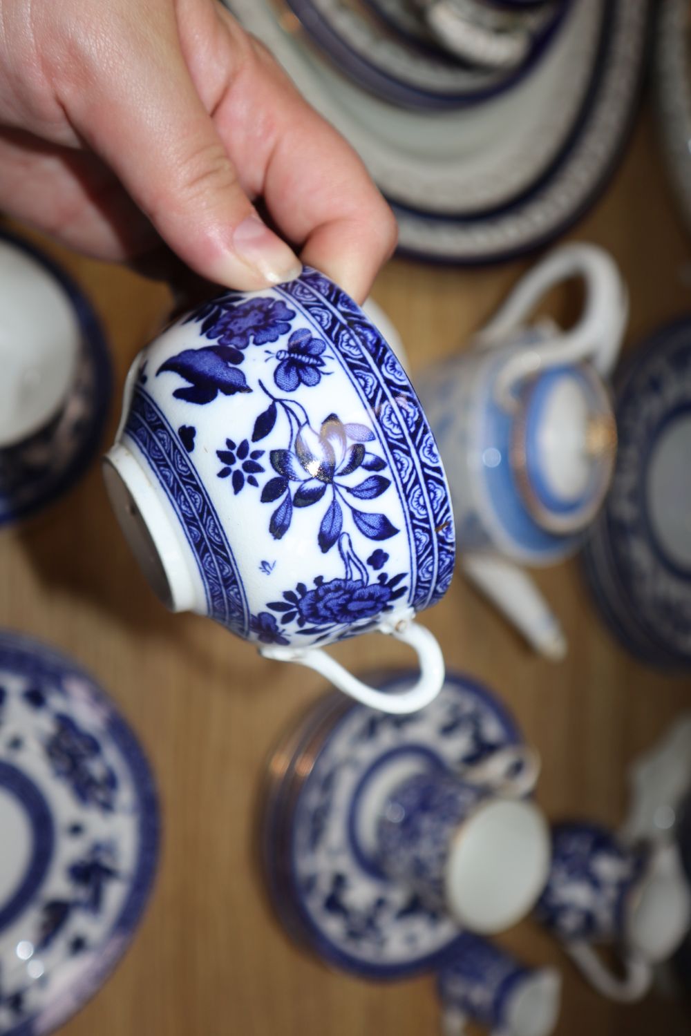 A collection of blue and white dinner ware and a Cauldon dinner service